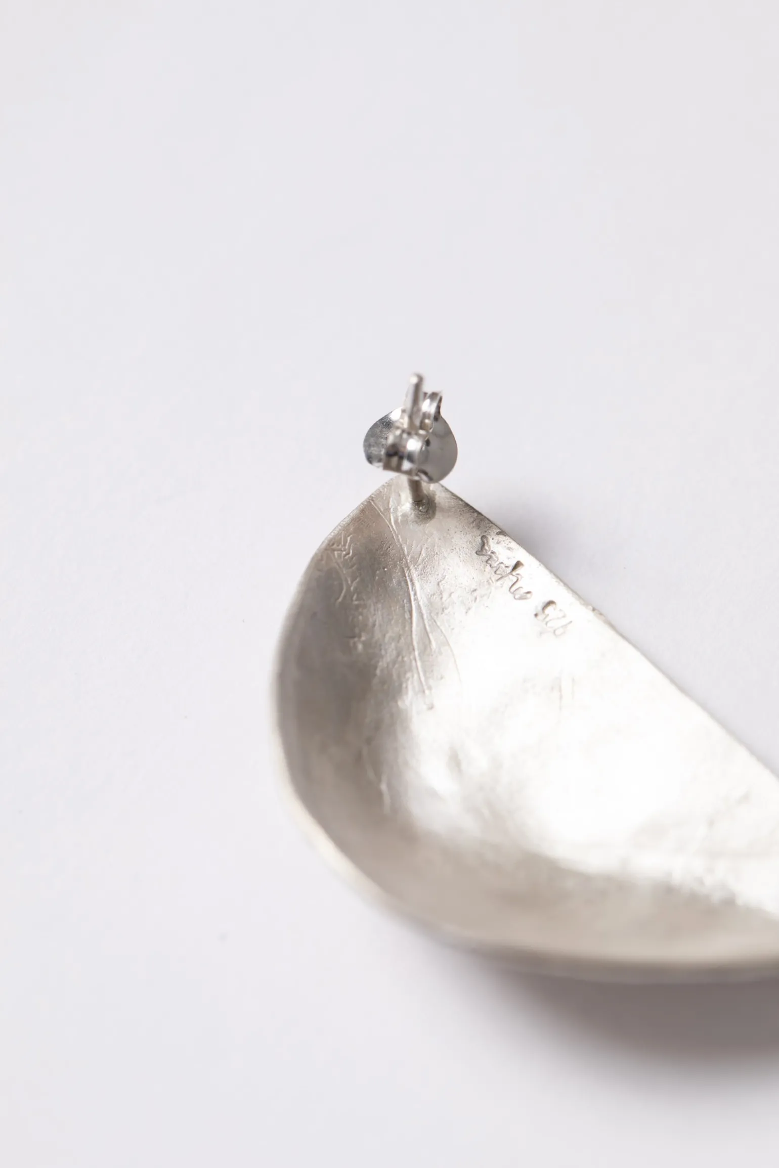 Kuu left, silver triangular earring