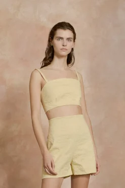 Limon, pale yellow high waisted shorts