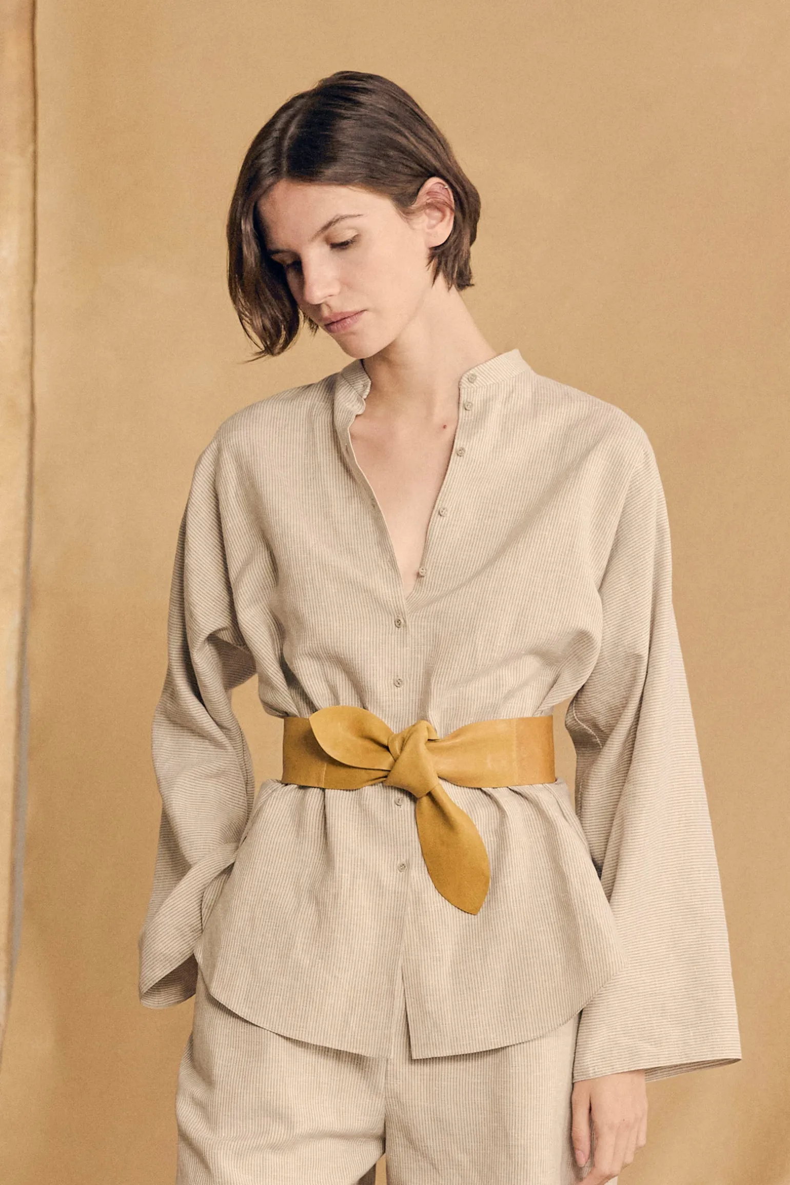 Tilo, gray and brown striped shirt