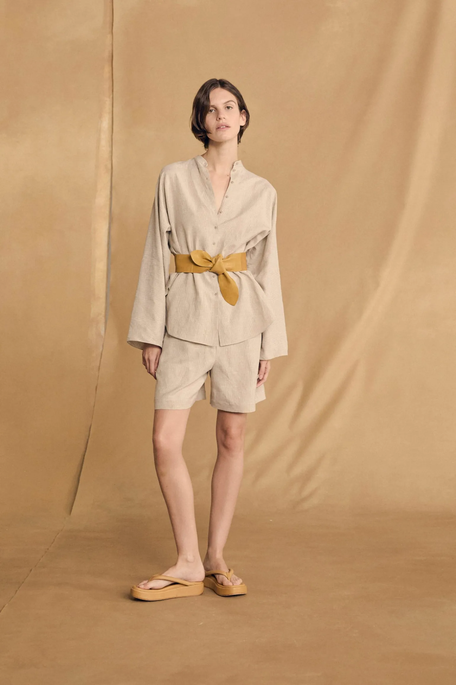 Tilo, gray and brown striped shirt