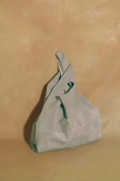 U XL, aqua suede bag