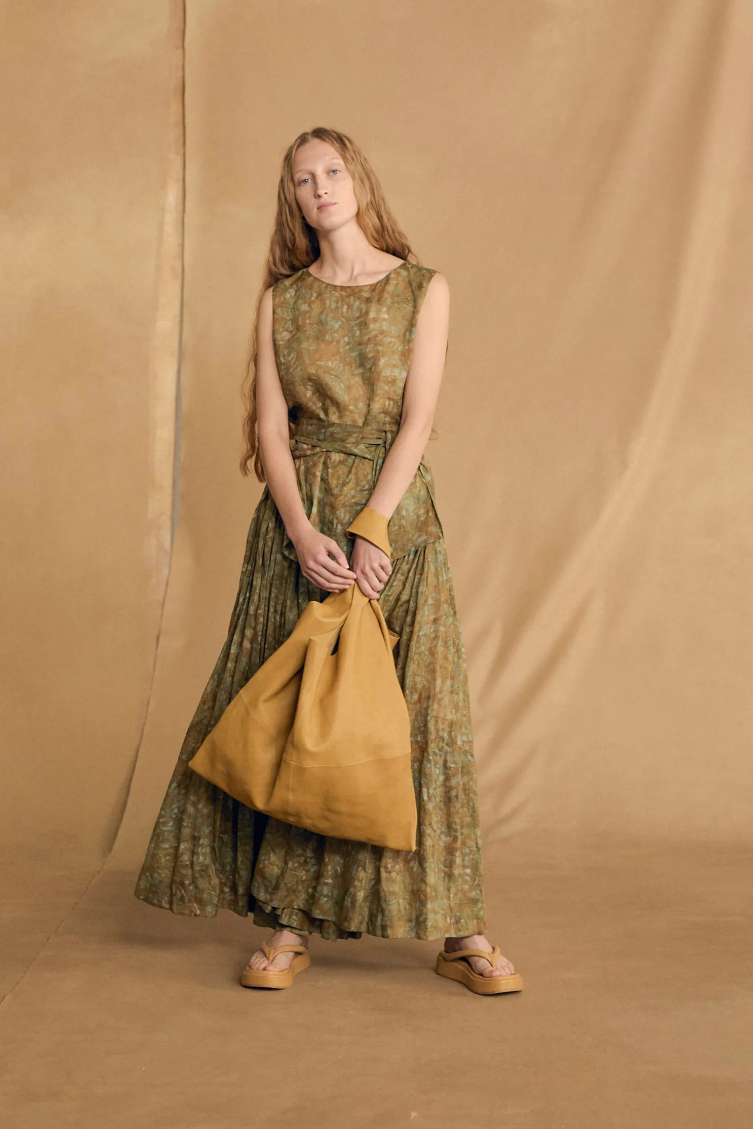 U XL, mustard leather bag